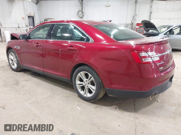 2015 Ford Taurus SEL z VIN 1FAHP2H88FG163179, wystawiony jako IAAI lot #42345579 z przebiegiem 142 424 mil mil oraz . Historia ofert i sprzedaży dostępna na DreamBid. Obrazek 3.
