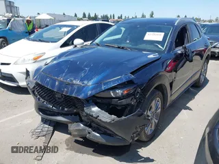 2023 Mazda CX-30 S Select with VIN 3MVDMBBM3PM514030, listed as a IAAI auction lot 42326959 with 41,226 mi miles and . Bid and sale history available at DreamBid. Image 6.