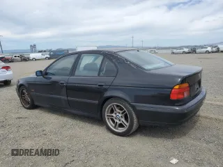 2000 BMW 5 Series z VIN WBADM5341YBY17346, wystawiony jako Copart lot #52618955 z przebiegiem 268 792 mil mil oraz Szkoda całkowita • Salvage title. Historia ofert i sprzedaży dostępna na DreamBid. Obrazek 2.