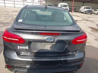 2016 Ford Focus SE z VIN 1FADP3F28GL360512, wystawiony jako IAAI lot #42427723 z przebiegiem 217 172 mil mil oraz . Historia ofert i sprzedaży dostępna na DreamBid. Obrazek 16.