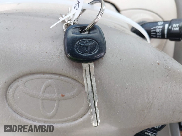 2001 Toyota Avalon XL z VIN 4T1BF28B61U144974, wystawiony jako IAAI lot #42112377 z przebiegiem 168 311 mil mil oraz . Historia ofert i sprzedaży dostępna na DreamBid. Obrazek 11.