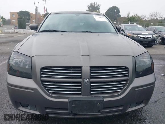 2005 Dodge Magnum RT with VIN 2D4GV58265H500284, listed as a IAAI auction lot 41194672 with 104,894 mi miles. Bid and sale history available at carsss.com. Image 6.