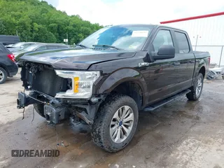 2018 Ford F-150 XL with VIN 1FTEW1E55JFE21905, listed as a IAAI auction lot 42276693 with 77,260 mi miles and . Bid and sale history available at DreamBid. Image 2.