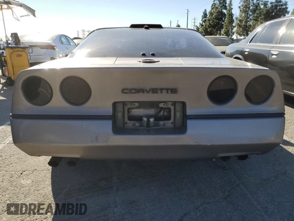 1988 Chevrolet Corvette z VIN 1G1YY2182J5103560, wystawiony jako Copart lot #44811925 z przebiegiem 99 645 mil mil oraz Czysty tytuł • Clean title. Historia ofert i sprzedaży dostępna na DreamBid. Obrazek 6.