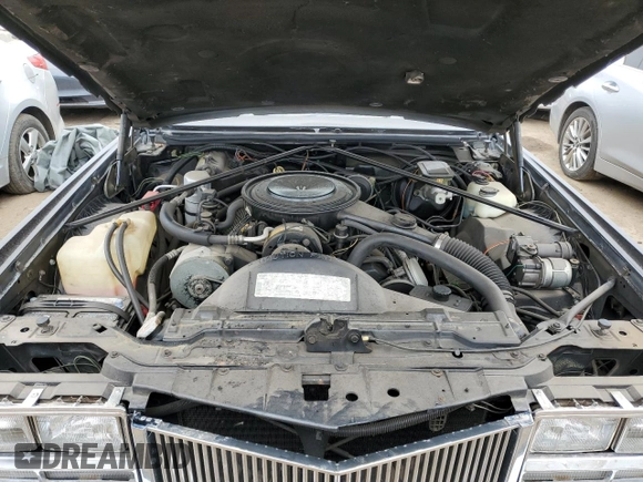 1985 Cadillac Eldorado z VIN 1G6EL5782FE634074, wystawiony jako Copart lot #44520964 z przebiegiem 74 425 mil mil oraz Szkody całkowita. Historia ofert i sprzedaży dostępna na DreamBid. Obrazek 11.