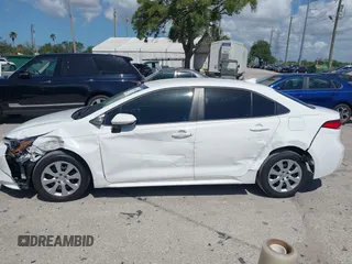 2023 Toyota Corolla LE with VIN 5YFB4MDE1PP058810, listed as a IAAI auction lot 42009318 with 10,950 mi miles and . Bid and sale history available at carsss.com. Image 14.