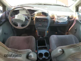 1999 Dodge Caravan with VIN 2B4FP25B0XR192013, listed as a Copart auction lot 55006624 with 195,008 mi miles and Salvage title. Bid and sale history available at DreamBid. Image 8.