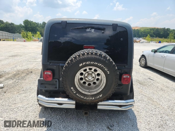 2001 Jeep Wrangler Sport с VIN 1J4FA49S91P347090, выставлен на аукционе Copart как лот 60436405 с пробегом 141 172 миль миль и Списание • Salvage title. История ставок и продаж доступна на DreamBid. Изображение 6.