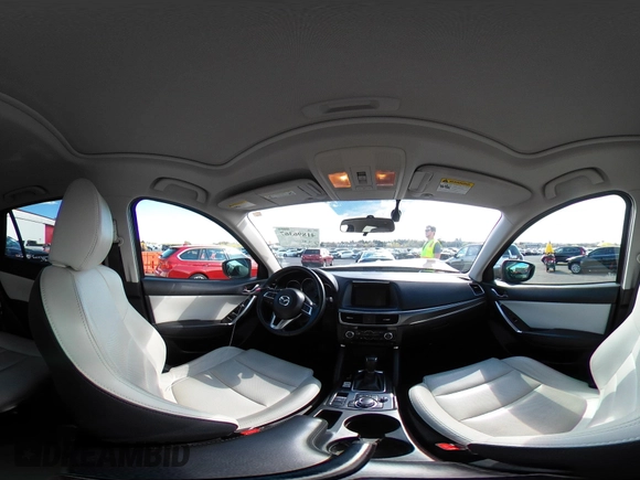 2016 Mazda CX-5 Grand Touring with VIN JM3KE2DYXG0773663, listed as a IAAI auction lot 41896367 with 86,571 mi miles and . Bid and sale history available at DreamBid. Image 19.