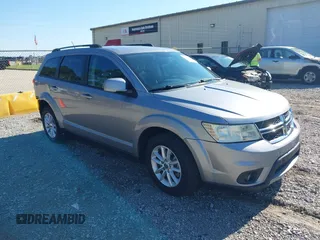 2017 Dodge Journey SXT z VIN 3C4PDCBG4HT563310, wystawiony jako IAAI lot #42190636 z przebiegiem 171 054 mil mil oraz . Historia ofert i sprzedaży dostępna na DreamBid. Obrazek 1.