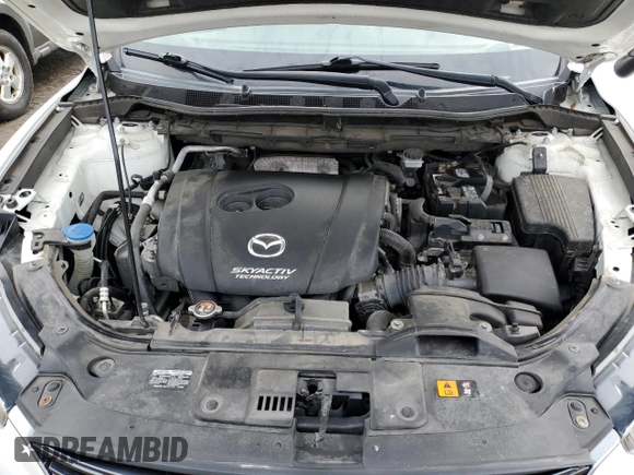 2016 Mazda CX-5 Touring with VIN JM3KE4CY7G0821701, listed as a Copart auction lot 43805495 with 144,416 mi miles and Salvage Title. Bid and sale history available at carsss.com. Image 12.