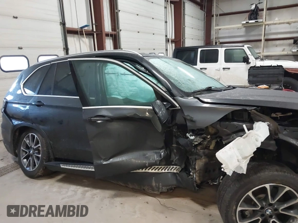 2016 BMW X5 xDrive40e with VIN 5UXKT0C55G0F75374, listed as a IAAI auction lot 41665965 with Not Provided miles and . Bid and sale history available at DreamBid. Image 12.
