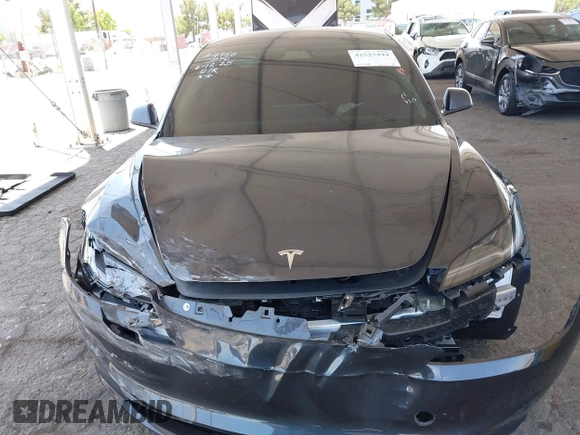 2025 Tesla Model 3 Long Range with VIN 5YJ3E1EA5SF978214, listed as a IAAI auction lot 42525444 with 6,489 mi miles and . Bid and sale history available at DreamBid. Image 13.