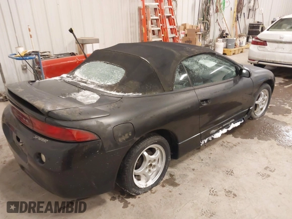 1999 Mitsubishi Eclipse GS with VIN 4A3AX35G3XE061702, listed as a IAAI auction lot 41323151 with 155,941 mi miles. Bid and sale history available at carsss.com. Image 4.