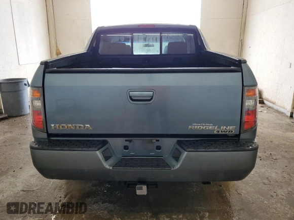 2007 Honda Ridgeline RTS z VIN 2HJYK16467H514031, wystawiony jako Copart lot #57571865 z przebiegiem 298 895 mil mil oraz Szkoda całkowita • Salvage title. Historia ofert i sprzedaży dostępna na DreamBid. Obrazek 6.