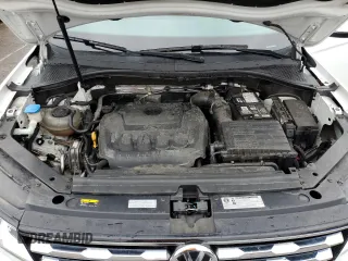2018 Volkswagen Tiguan S z VIN 3VV1B7AXXJM056479, wystawiony jako Copart lot #53113125 z przebiegiem 99 367 mil mil oraz Szkoda całkowita • Salvage title. Historia ofert i sprzedaży dostępna na DreamBid. Obrazek 13.