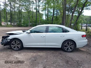 2021 Volkswagen Passat SE with VIN 1VWSA7A38MC014396, listed as a IAAI auction lot 42201818 with 62,193 mi miles and . Bid and sale history available at DreamBid. Image 15.