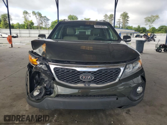 2012 Kia Sorento EX с VIN 5XYKU4A64CG261606, выставлен на аукционе Copart как лот 60863835 с пробегом 196 380 миль миль и Списание • Salvage title. История ставок и продаж доступна на DreamBid. Изображение 5.