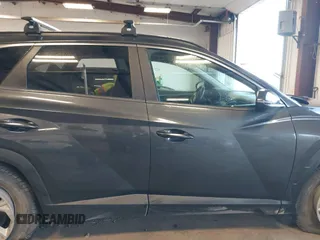 2022 Hyundai Tucson SEL with VIN 5NMJBCAE6NH035482, listed as a IAAI auction lot 41759838 with 70,418 mi miles. Bid and sale history available at carsss.com. Image 13.