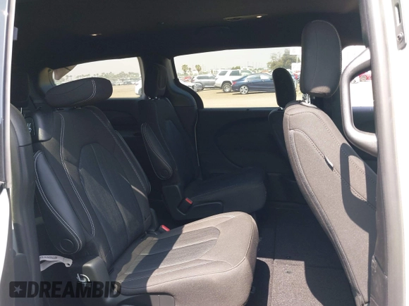 2021 Chrysler Pacifica Touring with VIN 2C4RC1FG7MR605587, listed as a IAAI auction lot 42329028 with 111,305 mi miles and . Bid and sale history available at DreamBid. Image 8.