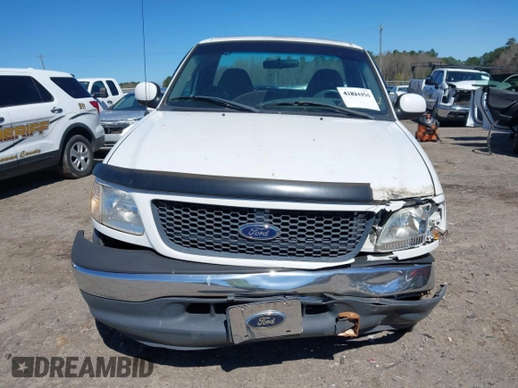 2001 Ford F-150 XL z VIN 1FTRF17W61NB22632, wystawiony jako IAAI lot #41824156 z przebiegiem Nie podano mil oraz . Historia ofert i sprzedaży dostępna na DreamBid. Obrazek 12.