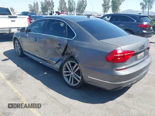 2016 Volkswagen Passat 1.8T S with VIN 1VWAT7A36GC060108, listed as a IAAI auction lot 41985291 with 108,196 mi miles. Bid and sale history available at carsss.com. Image 3.