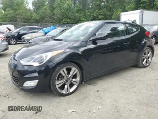 2013 Hyundai Veloster w/Gray Int z VIN KMHTC6AD2DU106887, wystawiony jako Copart lot #58149635 z przebiegiem 159 914 mil mil oraz Szkoda całkowita • Salvage title. Historia ofert i sprzedaży dostępna na DreamBid. Obrazek 1.