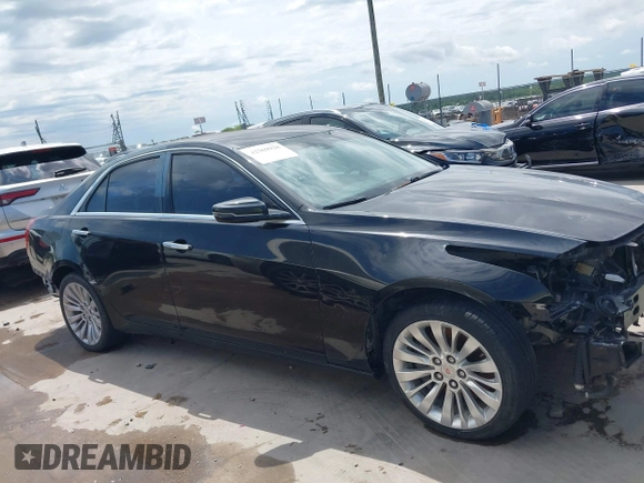 2014 Cadillac CTS Vsport RWD z VIN 1G6AU5S84E0149790, wystawiony jako IAAI lot #42369928 z przebiegiem 96 715 mil mil oraz . Historia ofert i sprzedaży dostępna na DreamBid. Obrazek 13.