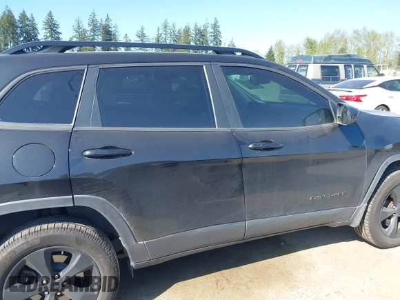 2015 Jeep Cherokee North with VIN 1C4PJMCS3FW777973, listed as a IAAI auction lot 42043203 with 158,536 mi miles. Bid and sale history available at carsss.com. Image 14.