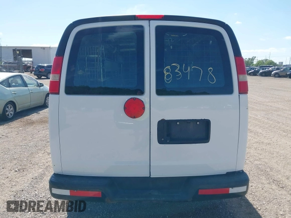 2014 Chevrolet Express Cargo with VIN 1GCSGAFX5E1152985, listed as a IAAI auction lot 42483478 with 208,518 mi miles and . Bid and sale history available at DreamBid. Image 16.