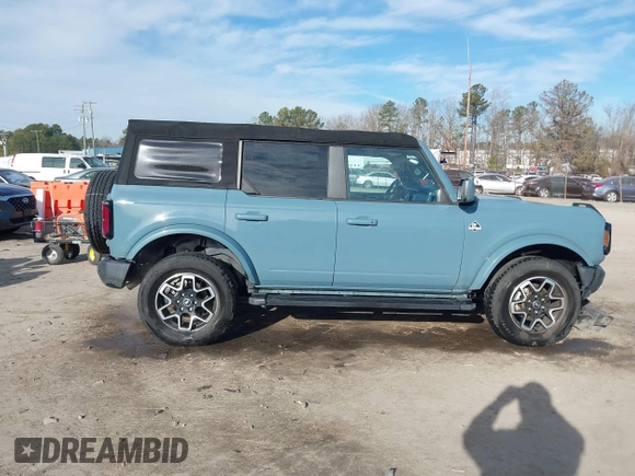 2022 Ford Bronco z VIN 1FMDE5DH0NLB77892, wystawiony jako IAAI lot #41466172 z przebiegiem 38 709 mil mil oraz . Historia ofert i sprzedaży dostępna na DreamBid. Obrazek 13.