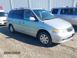 2004 Honda Odyssey EX-L with VIN 5FNRL18974B057715, listed as a IAAI auction lot 41762518 with 193,626 mi miles and . Bid and sale history available at DreamBid. Image 1.