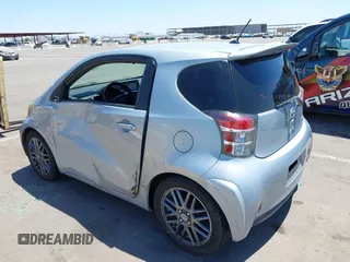 2014 Scion iQ with VIN JTNJJXB02EJ027026, listed as a IAAI auction lot 42619439 with 103,261 mi miles and . Bid and sale history available at DreamBid. Image 6.