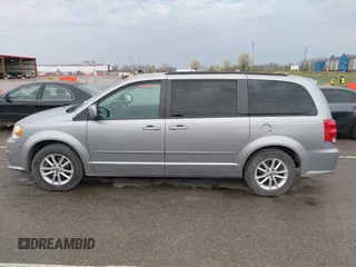 2016 Dodge Grand Caravan SXT with VIN 2C4RDGCG3GR321933, listed as a IAAI auction lot 41895209 with 186,502 mi miles and . Bid and sale history available at DreamBid. Image 14.