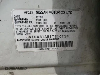 2001 Nissan Maxima SE 20th Anniversary. z VIN JN1CA31A51T310134, wystawiony jako Copart lot #66530384 z przebiegiem 172 384 mil mil oraz Szkoda całkowita • Salvage title. Historia ofert i sprzedaży dostępna na DreamBid. Obrazek 12.