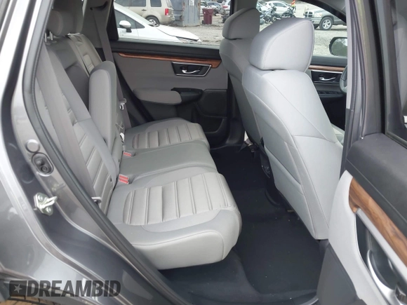 2019 Honda CR-V EX with VIN 7FARW1H57KE037678, listed as a IAAI auction lot 41790923 with 61,754 mi miles and . Bid and sale history available at DreamBid. Image 8.