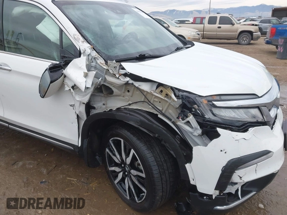 2021 Honda Pilot Elite with VIN 5FNYF6H03MB044154, listed as a IAAI auction lot 41050202 with 60,331 mi miles and . Bid and sale history available at DreamBid. Image 6.