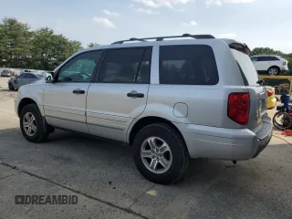 2005 Honda Pilot EX-L with VIN 5FNYF18555B023869, listed as a Copart auction lot 61738505 with 257,121 mi miles and Clean title. Bid and sale history available at DreamBid. Image 2.