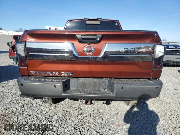 2016 Nissan Titan Platinum Reserve z VIN 1N6BA1F23GN509157, wystawiony jako Copart lot #50180435 z przebiegiem 135 035 mil mil oraz Czysty tytuł • Clean title. Historia ofert i sprzedaży dostępna na DreamBid. Obrazek 6.