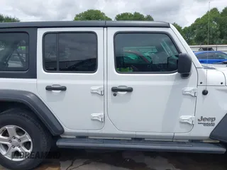 2019 Jeep Wrangler Unlimited Sport S with VIN 1C4HJXDN3KW689739, listed as a IAAI auction lot 42358604 with 73,271 mi miles and . Bid and sale history available at DreamBid. Image 14.