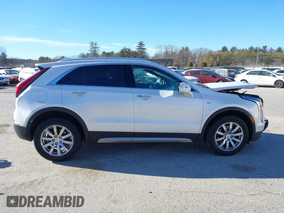 2022 Cadillac XT4 AWD Premium Luxury with VIN 1GYFZDR41NF105299, listed as a IAAI auction lot 41257154 with 34,904 mi miles and . Bid and sale history available at carsss.com. Image 13.