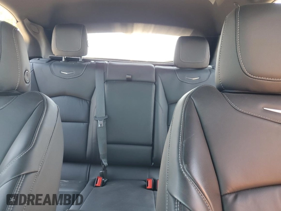 2024 Cadillac XT4 AWD Premium Luxury with VIN 1GYFZDR48RF153128, listed as a Copart auction lot 60712485 with 14,765 mi miles and Salvage title. Bid and sale history available at DreamBid. Image 10.