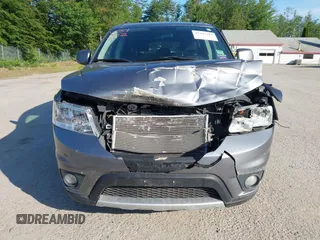 2013 Dodge Journey SXT with VIN 3C4PDDBGXDT607052, listed as a IAAI auction lot 42543102 with 157,325 mi miles and . Bid and sale history available at DreamBid. Image 6.