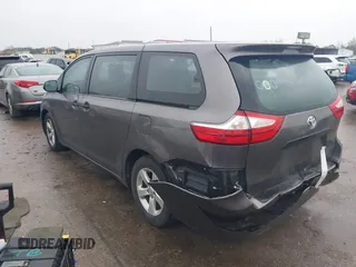 2015 Toyota Sienna L with VIN 5TDZK3DC9FS563593, listed as a IAAI auction lot 41466419 with 136,394 mi miles and . Bid and sale history available at DreamBid. Image 3.