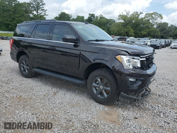 2021 Ford Expedition XLT with VIN 1FMJU1HT0MEA03496, listed as a Copart auction lot 57911685 with 96,462 mi miles and Salvage title. Bid and sale history available at DreamBid. Image 4.
