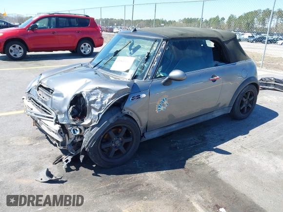 2005 MINI Convertible S with VIN WMWRH33545TF85051, listed as a IAAI auction lot 41843147 with 109,656 mi miles and . Bid and sale history available at DreamBid. Image 2.
