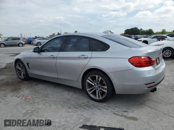 2015 BMW 4 Series 428i xDrive with VIN WBA4C9C55FD331210, listed as a Copart auction lot 54158235 with 88,372 mi miles and Salvage title. Bid and sale history available at DreamBid. Image 2.