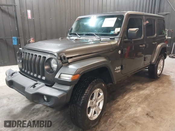 2018 Jeep Wrangler Unlimited Sport S with VIN 1C4HJXDG5JW126496, listed as a IAAI auction lot 42390584 with 163,476 mi miles and . Bid and sale history available at DreamBid. Image 19.
