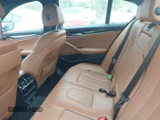 2019 BMW 5 Series 530i xDrive with VIN WBAJA7C53KWW48916, listed as a IAAI auction lot 42053125 with 108,496 mi miles. Bid and sale history available at carsss.com. Image 8.