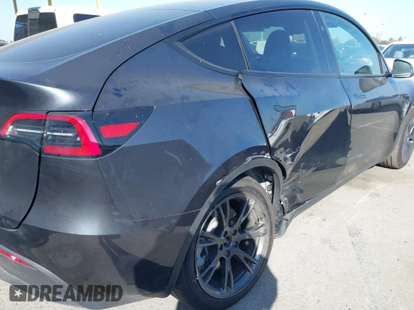 2025 Tesla Model Y Long Range with VIN 7SAYGDED2SF228414, listed as a IAAI auction lot 41706470 with 11,319 mi miles and . Bid and sale history available at DreamBid. Image 6.